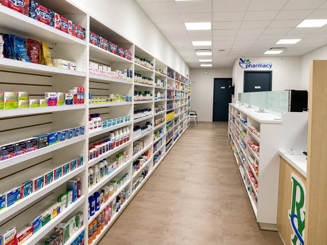Friendly pharmacist reviewing medication with a patient